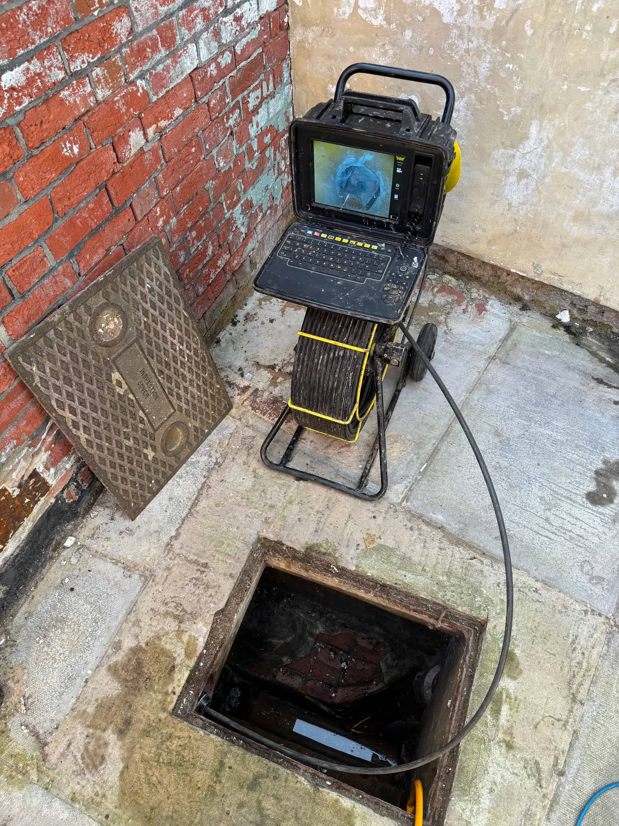 Professional drain inspection camera used for rodent prevention and pipe repairs.